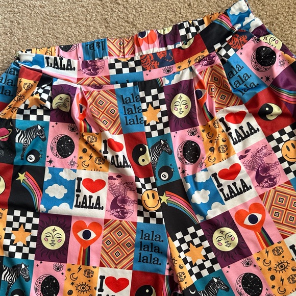 The Original Discontinued Dressed in LaLa 
Signature Print Pleated Wide Leg Pant - Picture 9 of 12